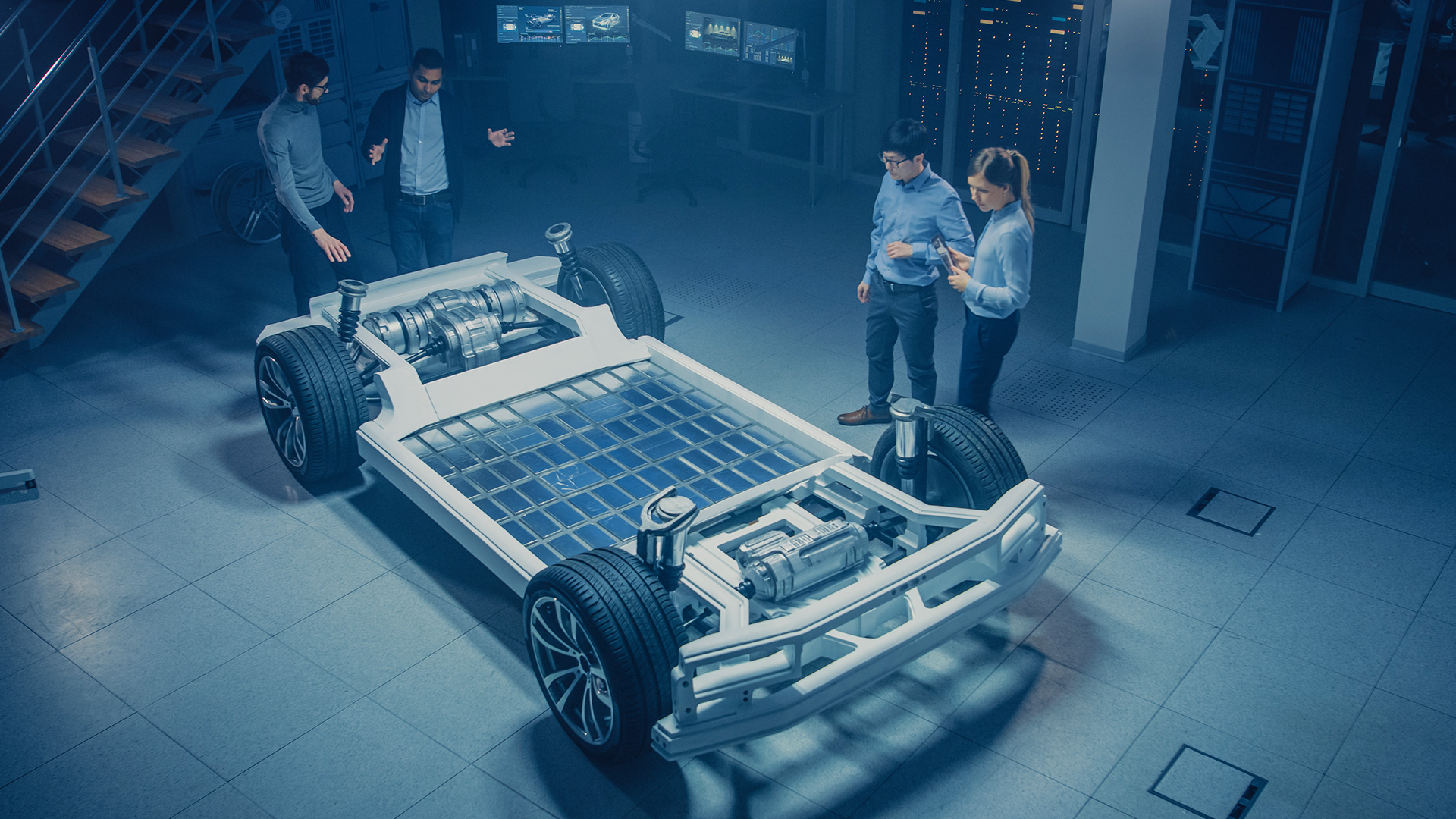 A diverse group of people gathers around a car equipped with solar panels, discussing sustainable energy solutions